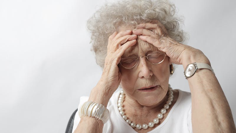 Woman experiencing headache