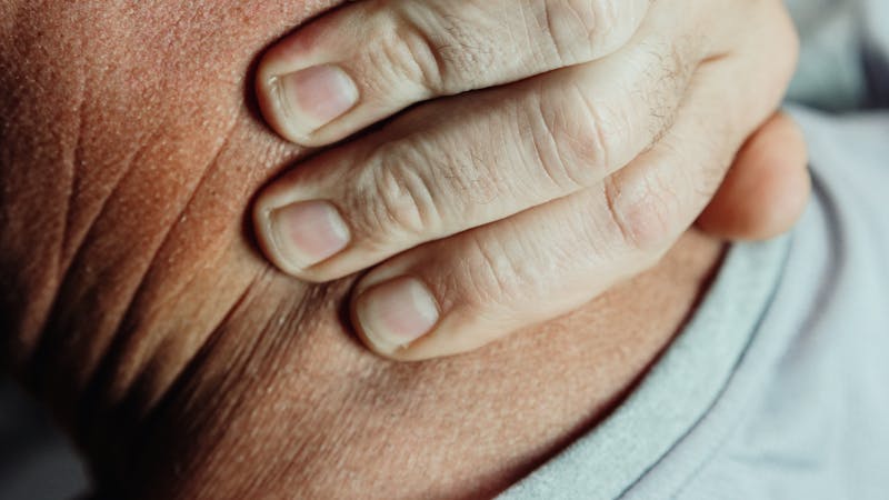 Chiropractor examining patient spine alignment