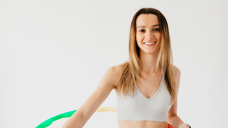 Person demonstrating thoracic kyphosis posture correction exercise